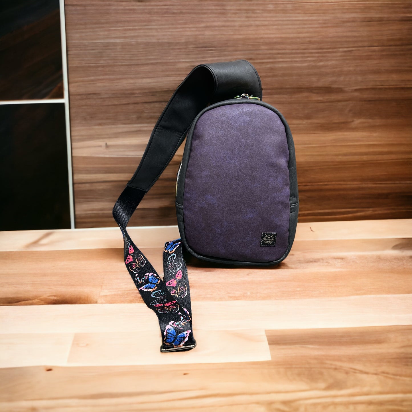 Purple butterfly slingbag